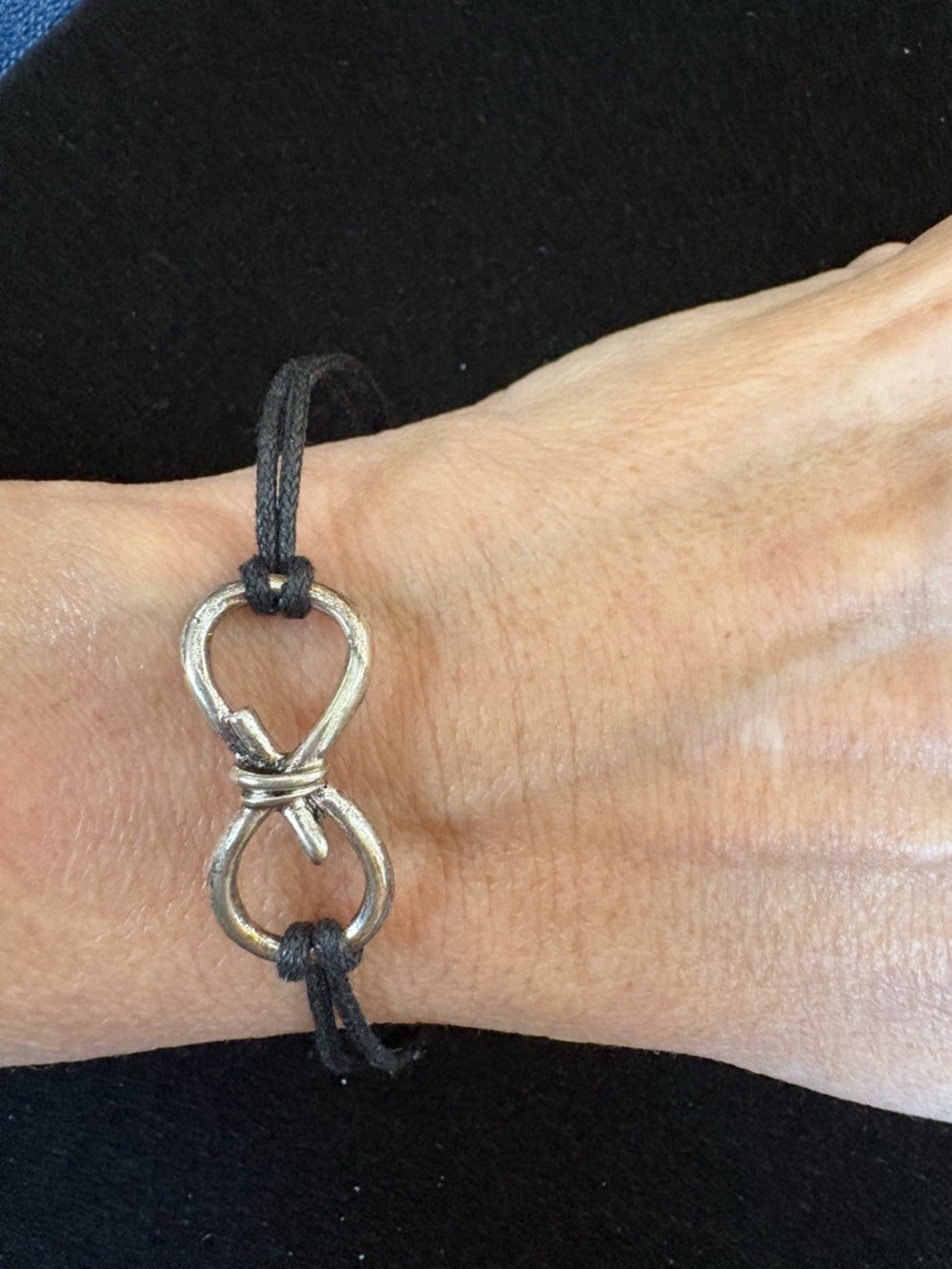 Silver Infinity Knot Bracelet with Black Cord